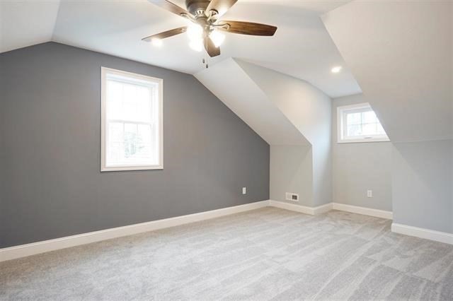 7 Bartons Rdg Road, Unit 7 Greenville, NH 03048 - Photo 17 of 28 an empty room with windows and fan
