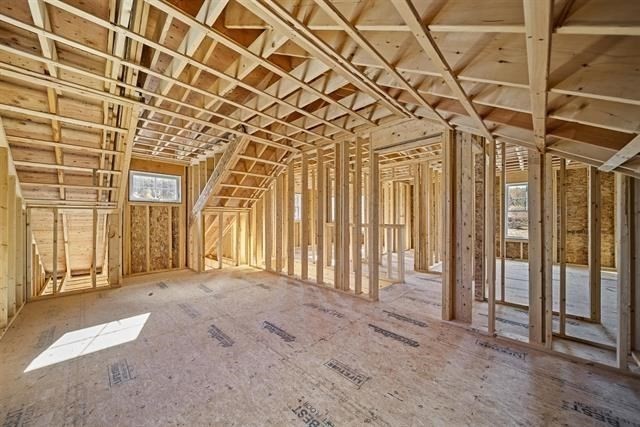 7 Bartons Rdg Road, Unit 7 Greenville, NH 03048 - Photo 21 of 28 a view of a room with a bed and large windows