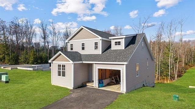 7 Bartons Rdg Road, Unit 7 Greenville, NH 03048 - Photo 25 of 28 a front view of a house with a yard