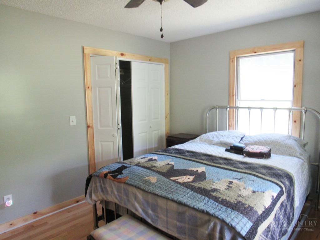 805 Ed Little Road Warrensville, NC 28693 - Photo 40 of 49 a bedroom with a bed and a window