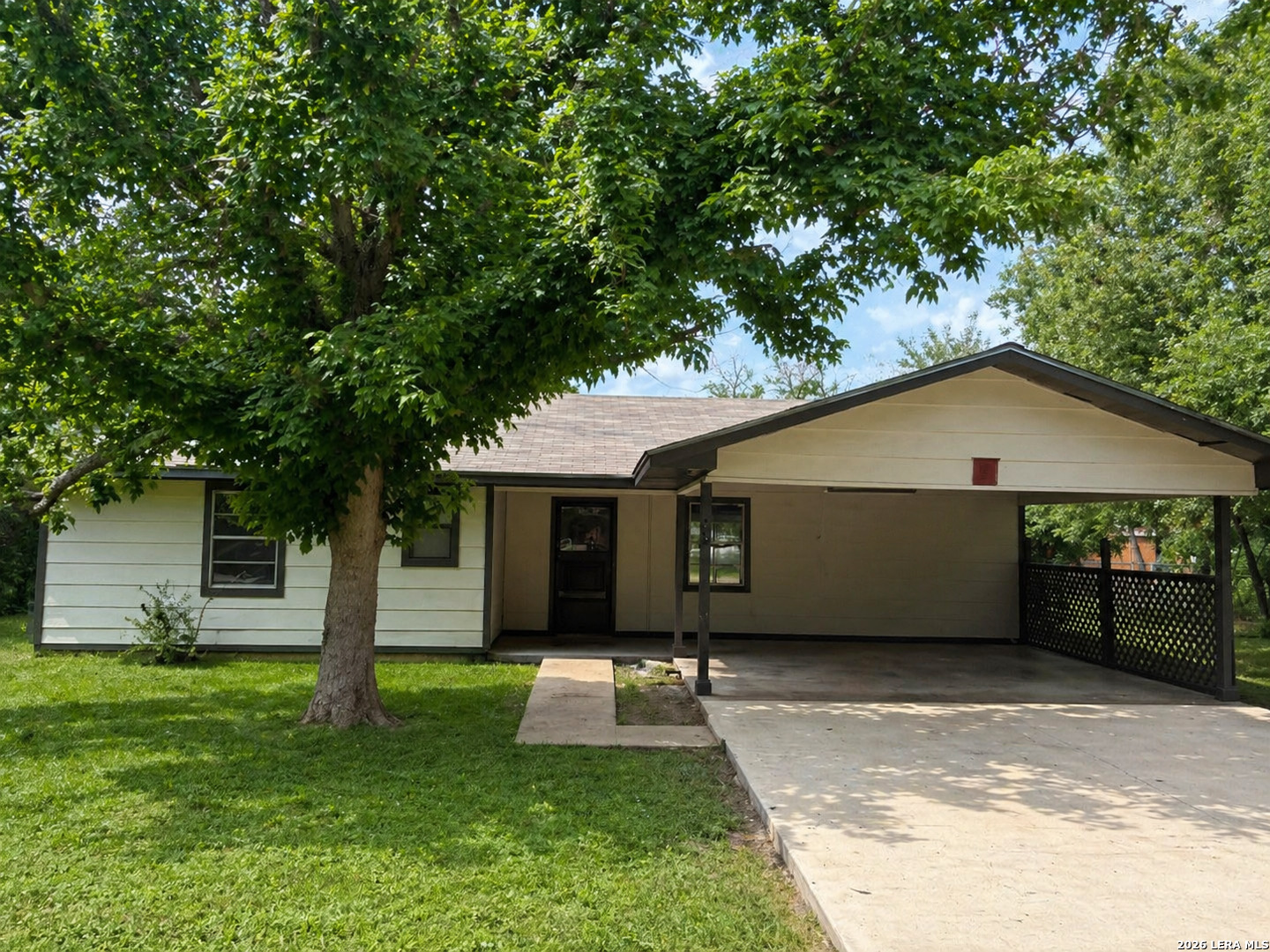 302 Booster Street Center Point, TX 78010 - Photo 1 of 6 a front view of house with yard and green space