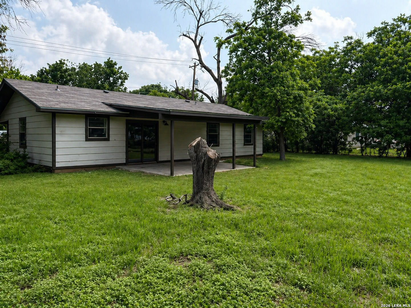 302 Booster Street Center Point, TX 78010 - Photo 6 of 6 a house view with a garden space