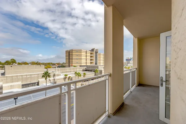 a kitchen with kitchen island a sink stove and cabinets