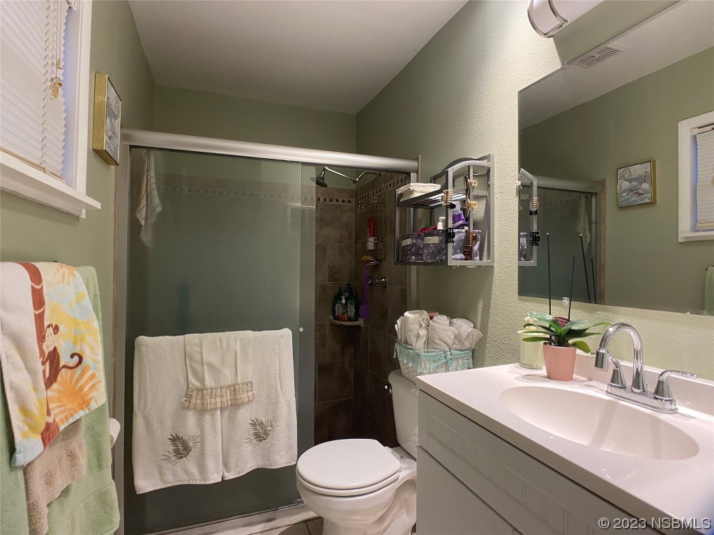Undisclosed Address Casselberry, FL 32707 - Photo 15 of 19 a bathroom with a sink toilet and shower