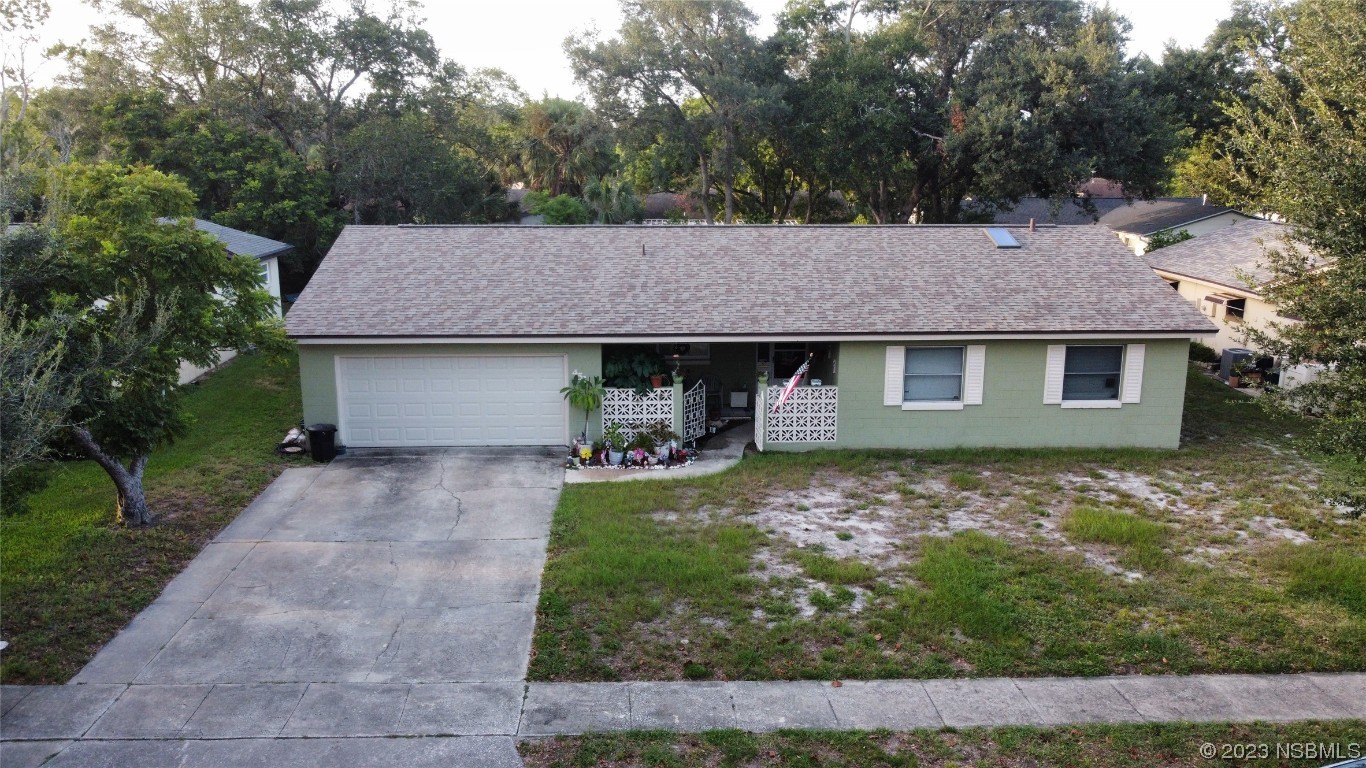 Undisclosed Address Casselberry, FL 32707 - Photo 2 of 19 a aerial view of a house with a yard