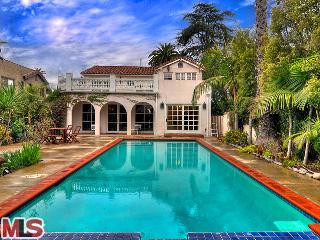 1668 Virginia Road Los Angeles, CA 90019 - Photo 1 of 1 a view of a house with swimming pool