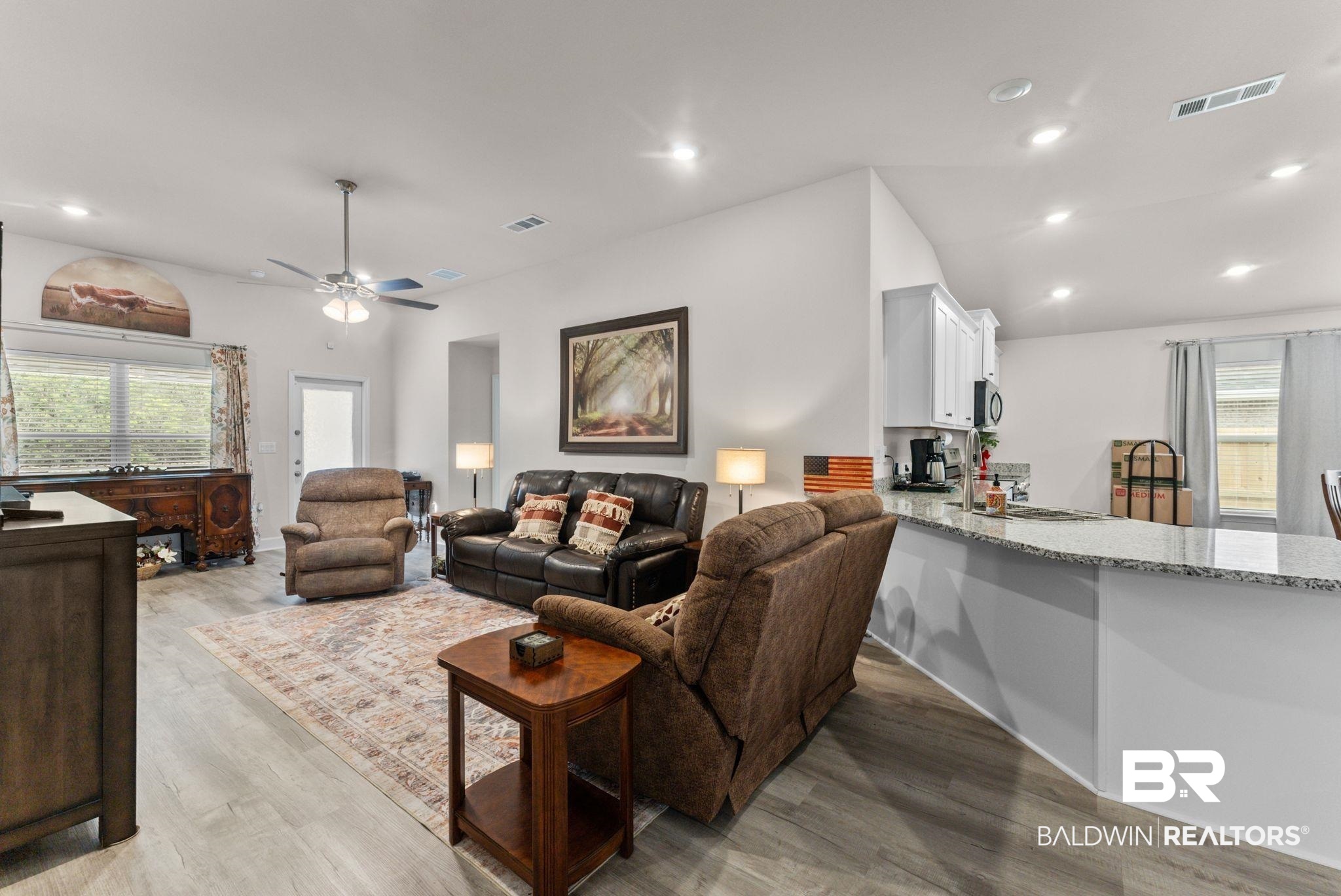 692 Mayflower Drive Foley, AL 36535 - Photo 9 of 40 Living area featuring healthy amount of natural light, recessed lighting, light wood finished floors, and ceiling fan