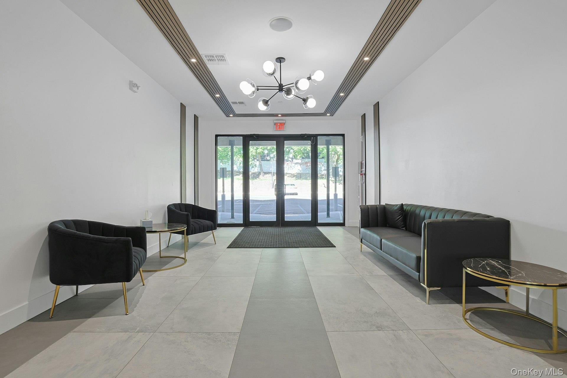 962 Rte 9W, Unit 106 Congers, NY 10920 - Photo 5 of 48 a living room with furniture and a large window