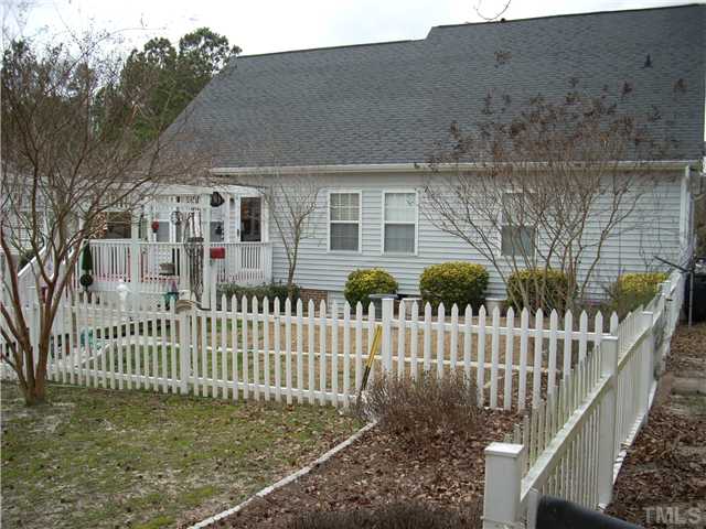 8125 Springwind Drive Willow Spring, NC 27592 - Photo 10 of 25 a view of a house with a small yard