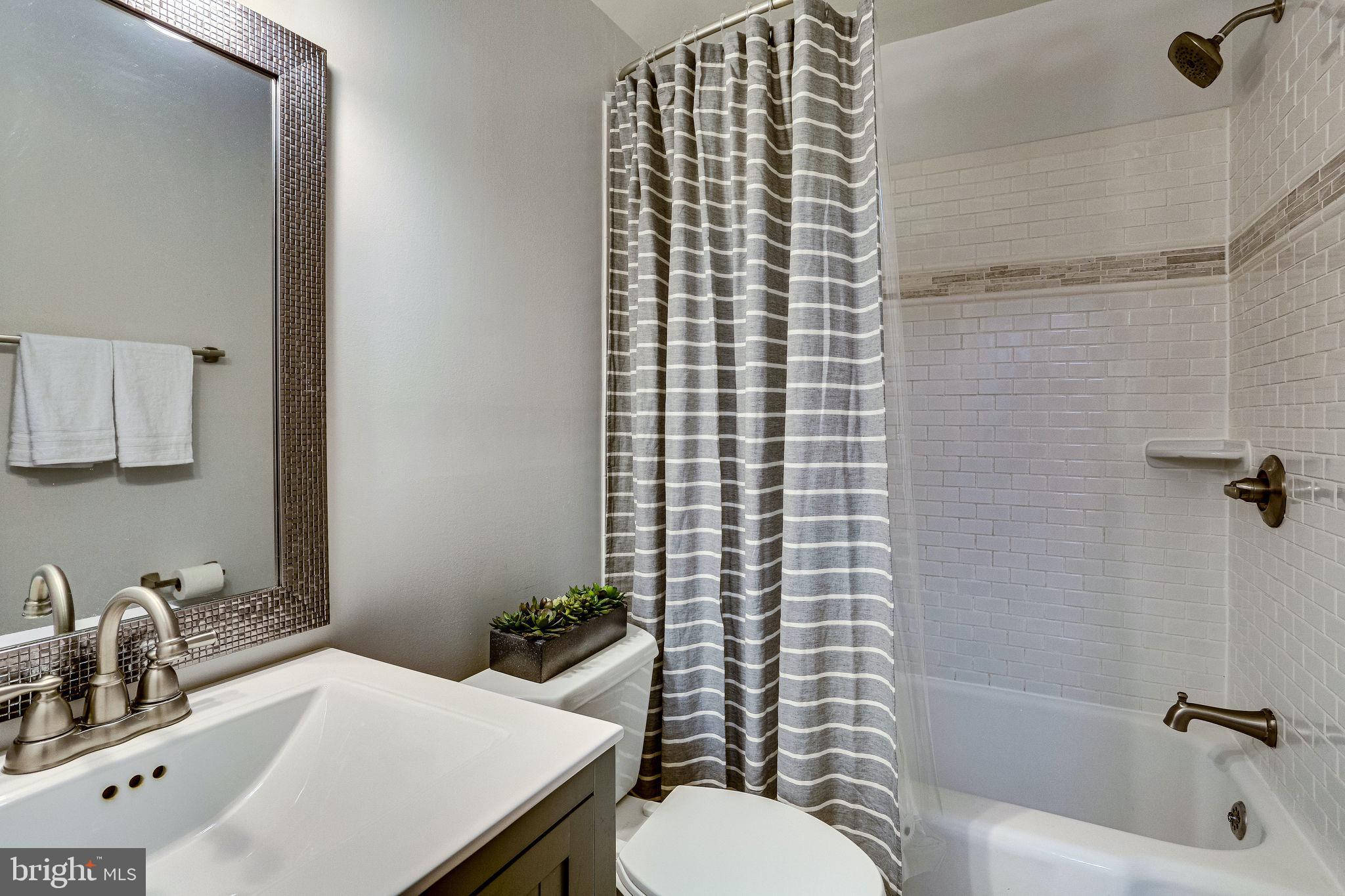 9907 Renfrew Road Silver Spring, MD 20901 - Photo 22 of 32 Updated bathroom