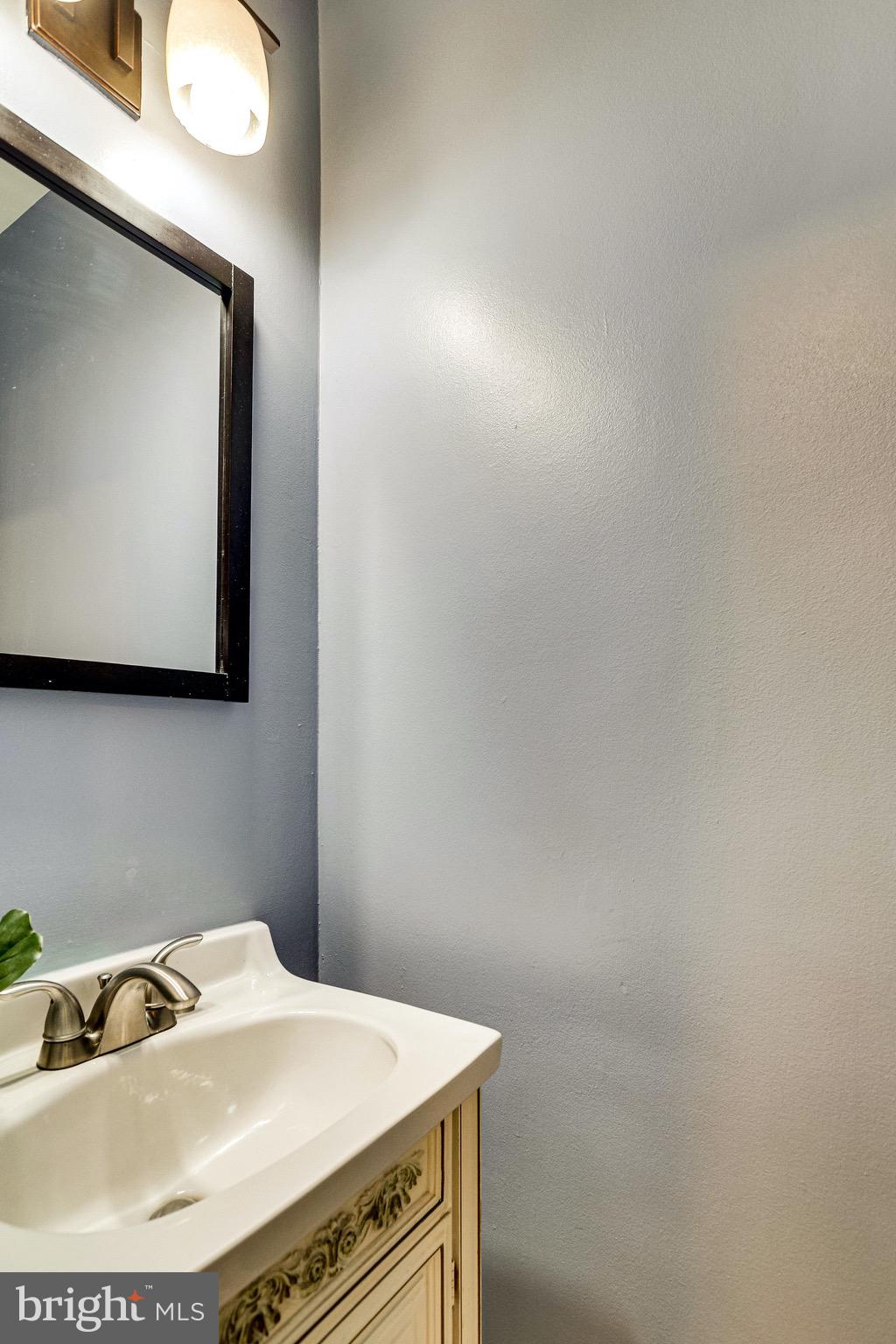 9907 Renfrew Road Silver Spring, MD 20901 - Photo 8 of 32 Main level half bathroom