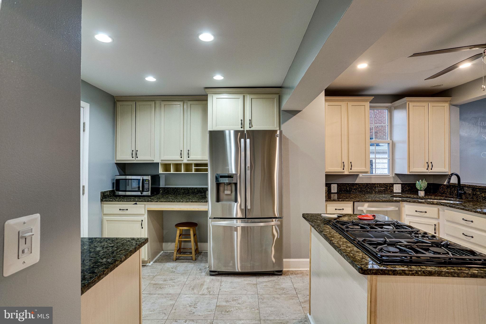 9907 Renfrew Road Silver Spring, MD 20901 - Photo 9 of 32 Updated kitchen w/ new stainless steel appliances