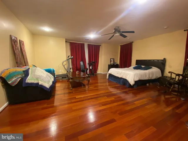 a bathroom with a tub and a shower