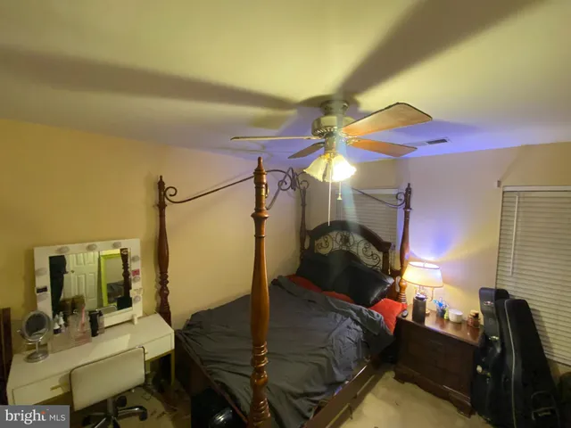 a living room with furniture fireplace and a flat screen tv
