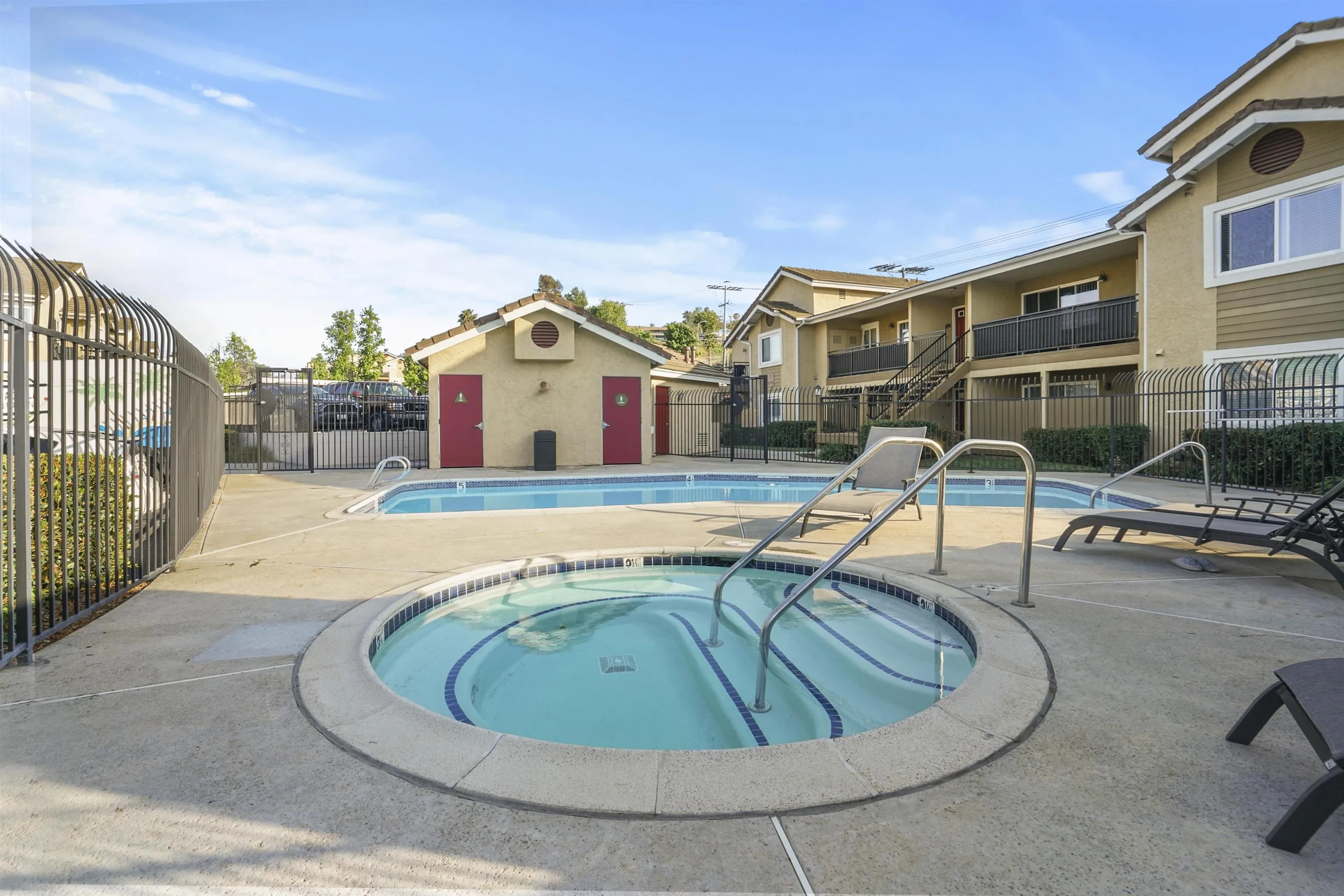 495 San Pasqual Valley Road, Unit 146 Escondido, CA 92025 - Photo 23 of 26 a view of a house with swimming pool