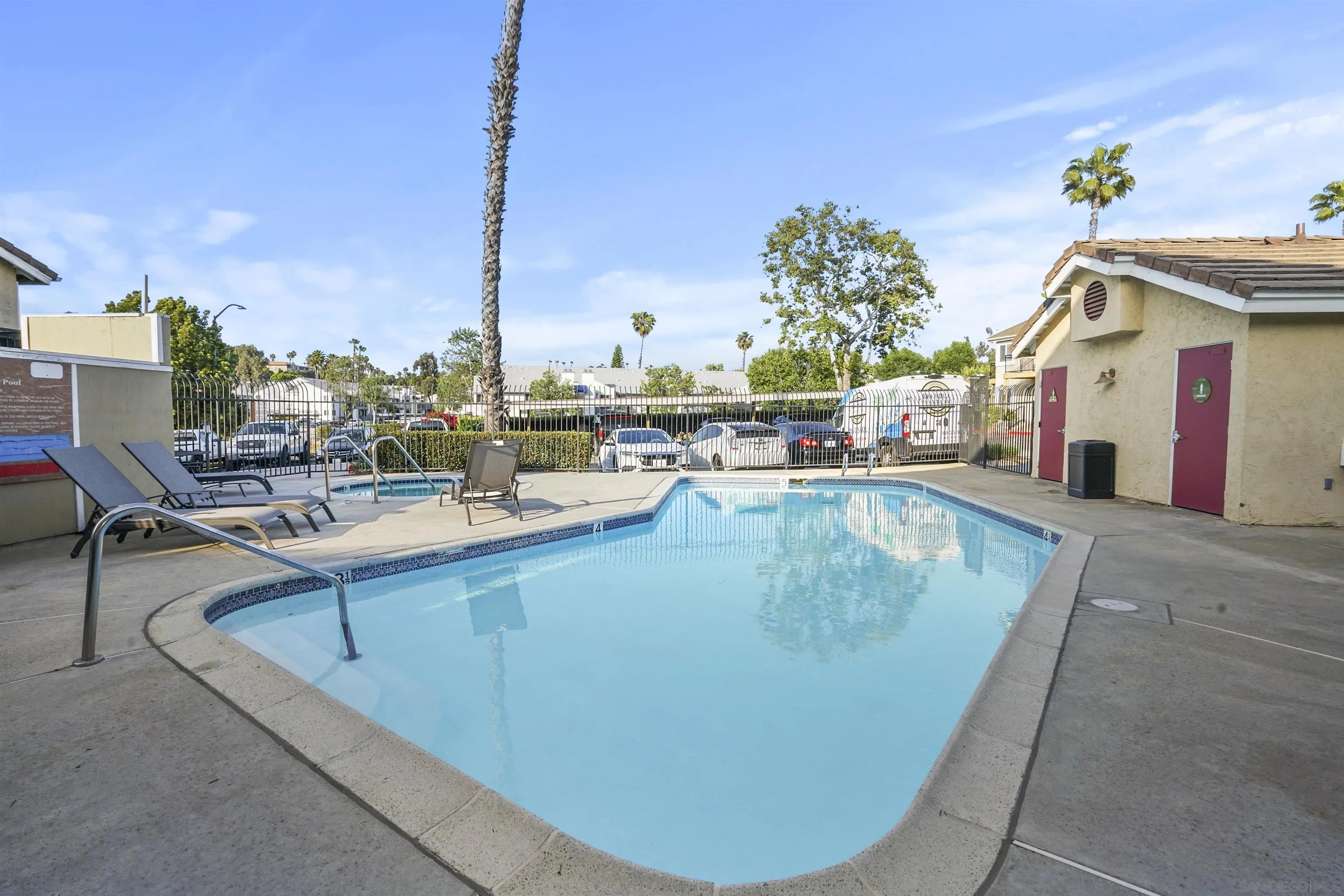 495 San Pasqual Valley Road, Unit 146 Escondido, CA 92025 - Photo 24 of 26 a view of a swimming pool with outdoor seating