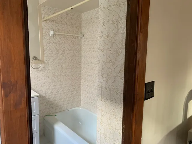 a bathroom with a bathtub