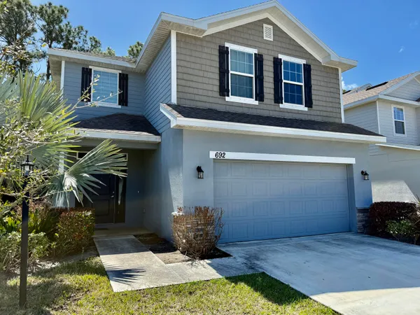 a front view of house with yard