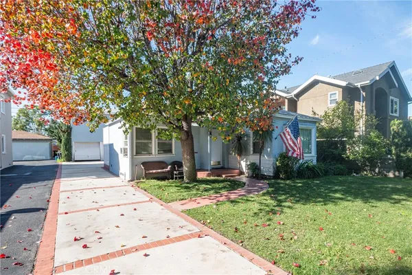 front view of a house with a yard