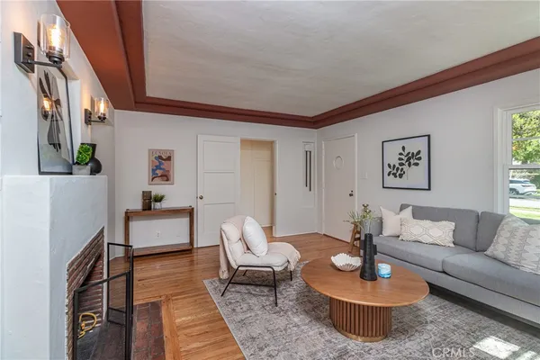 a living room with furniture and a table