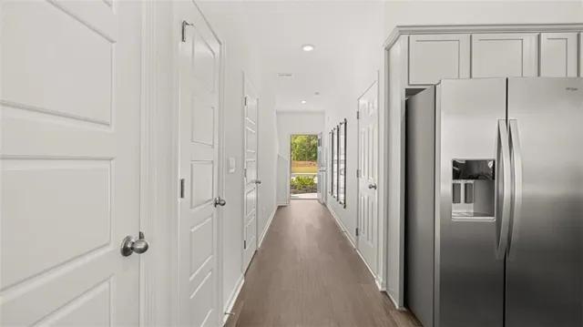 a view of a bathroom with a glass shower door