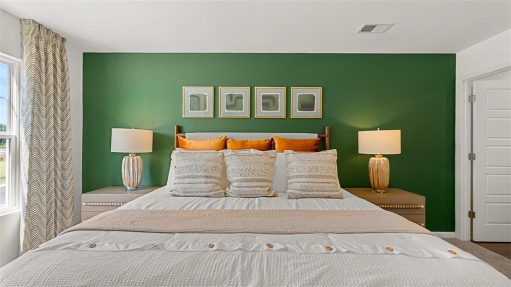 123 Kenmore Circle Perry, GA 31069 - Photo 33 of 48 a bedroom with a bed and window