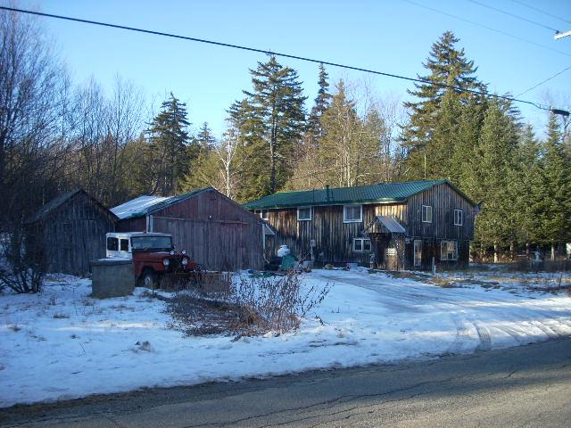 515 Center Road Savoy, MA 01256 - Photo 1 of 5 a front view of a house with garden
