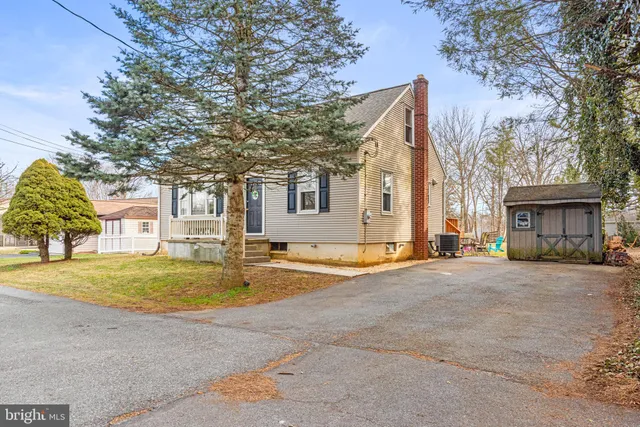 a house with trees in front of it