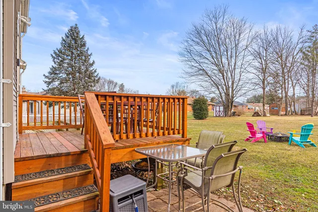 a view of a chairs and table on the wooden floor