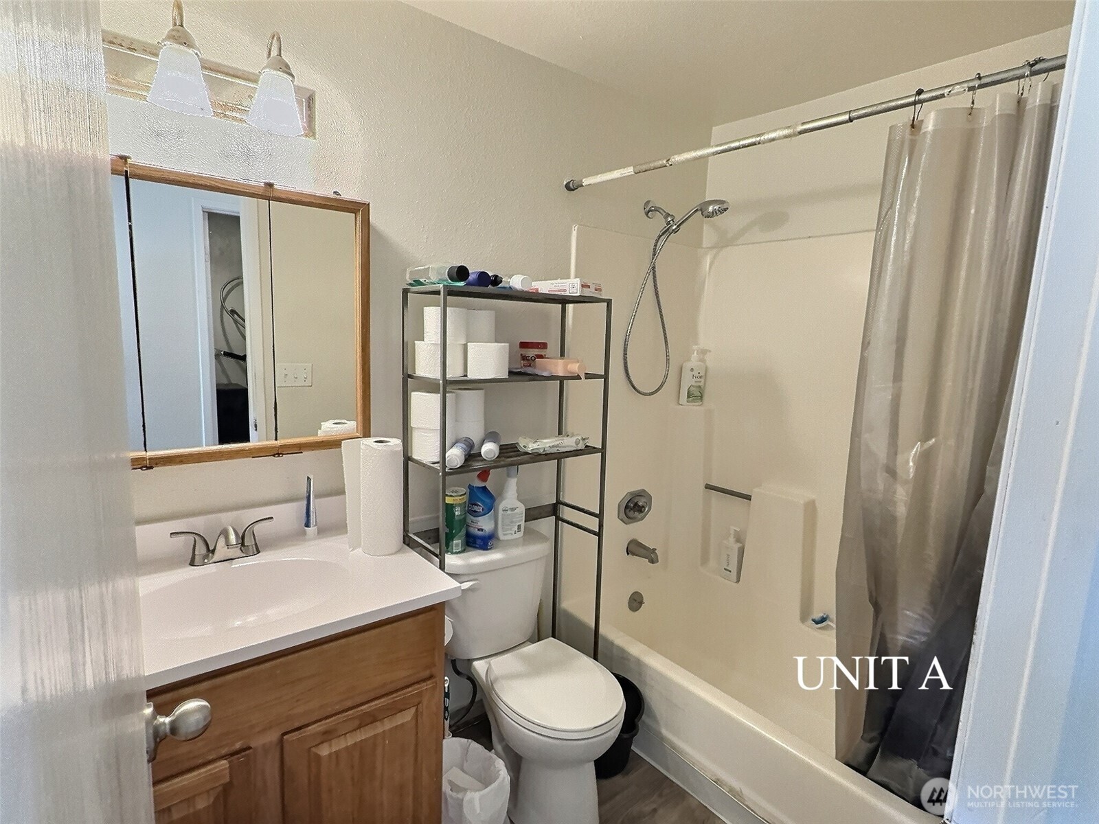 115 South 339th Circle Federal Way, WA 98003 - Photo 11 of 35 a bathroom with a sink toilet and shower