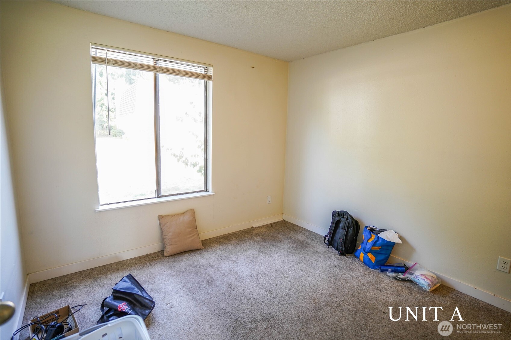 115 South 339th Circle Federal Way, WA 98003 - Photo 12 of 35 a view of an empty room with a window