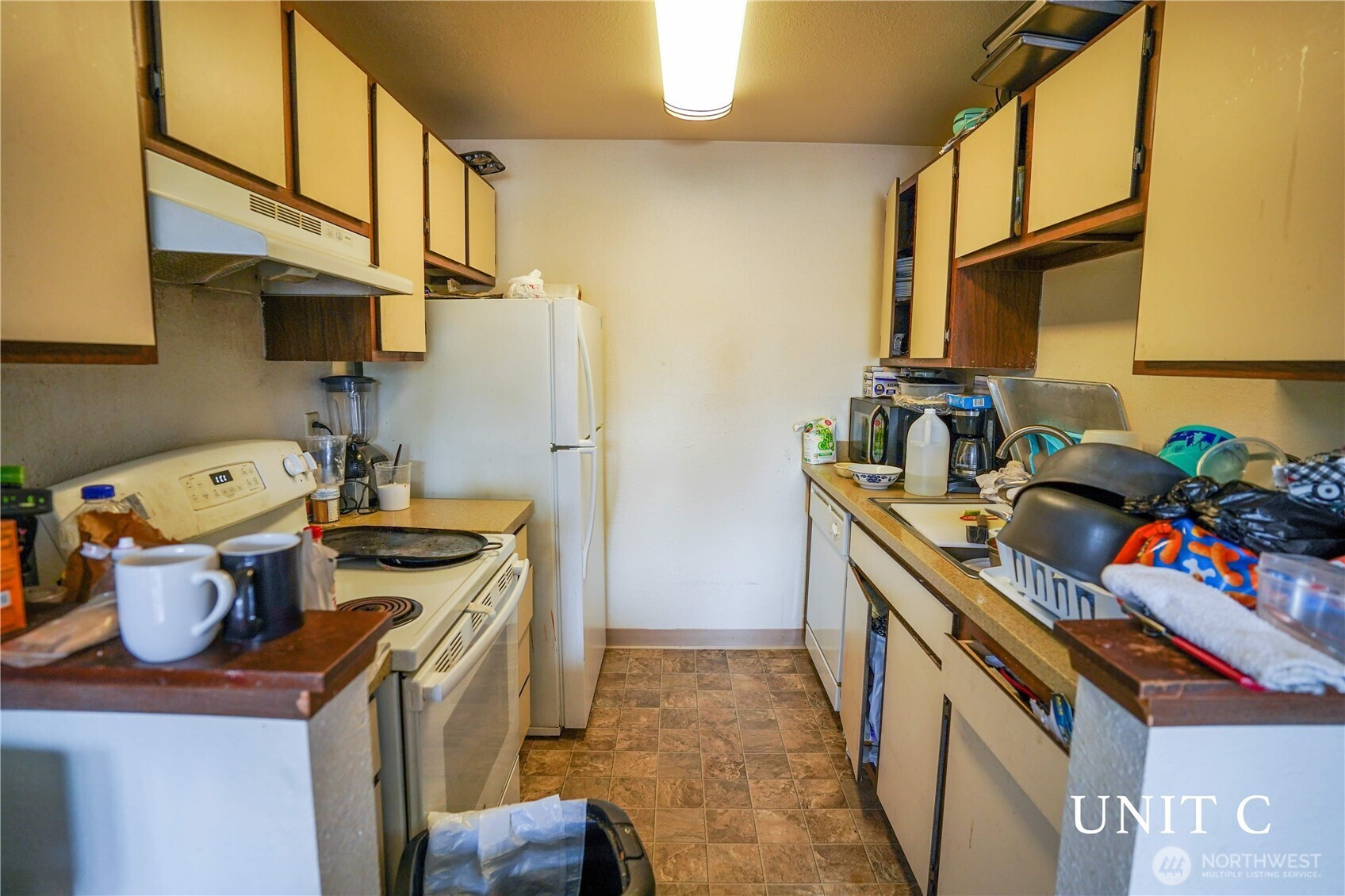 115 South 339th Circle Federal Way, WA 98003 - Photo 21 of 35 a kitchen with a sink and a stove top oven