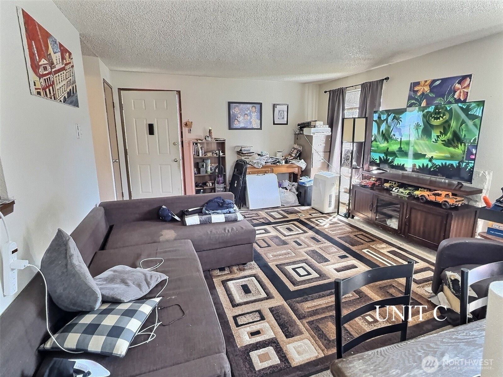 115 South 339th Circle Federal Way, WA 98003 - Photo 26 of 35 a living room with furniture and a flat screen tv