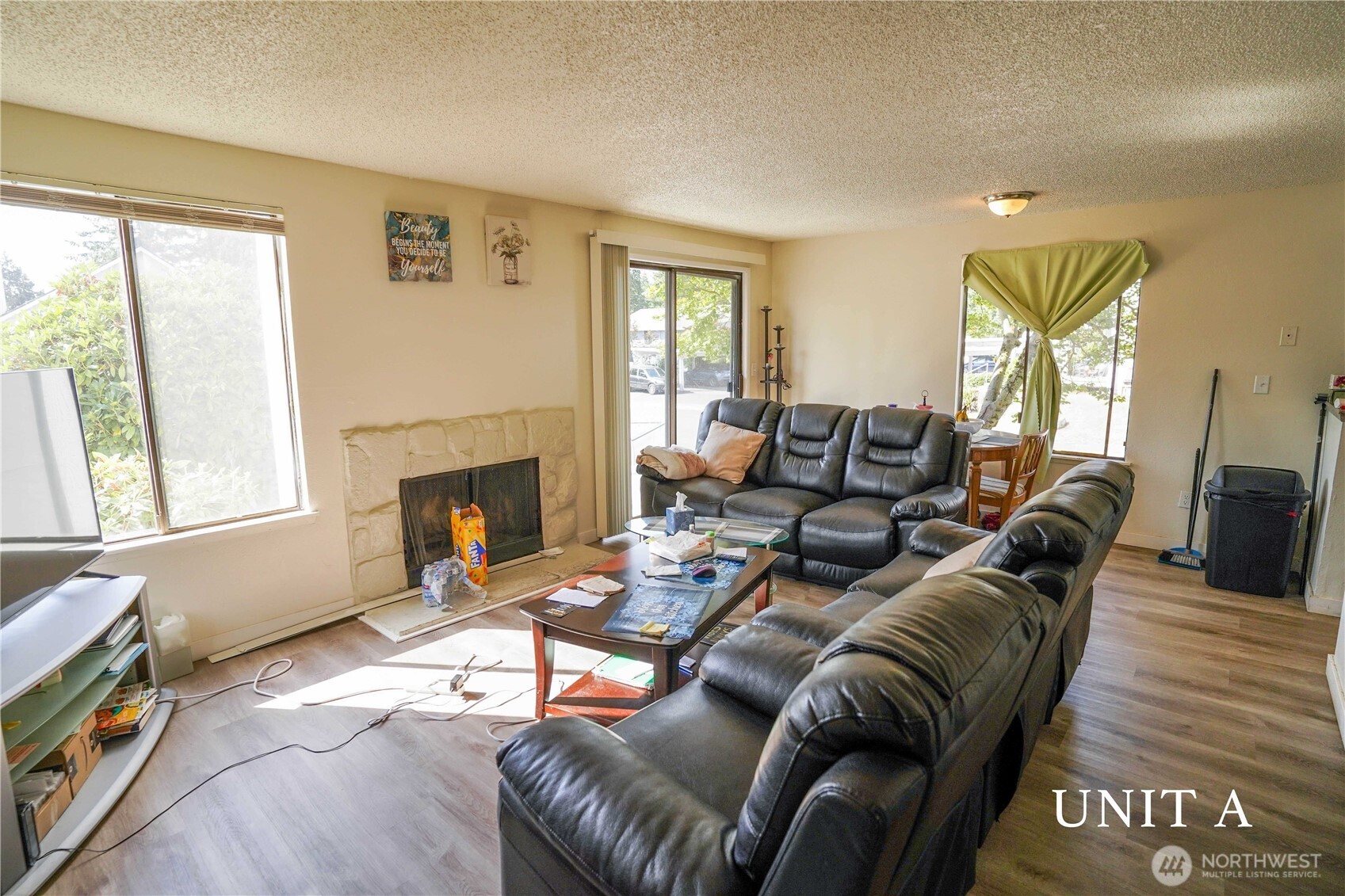 115 South 339th Circle Federal Way, WA 98003 - Photo 7 of 35 a living room with furniture and a fireplace