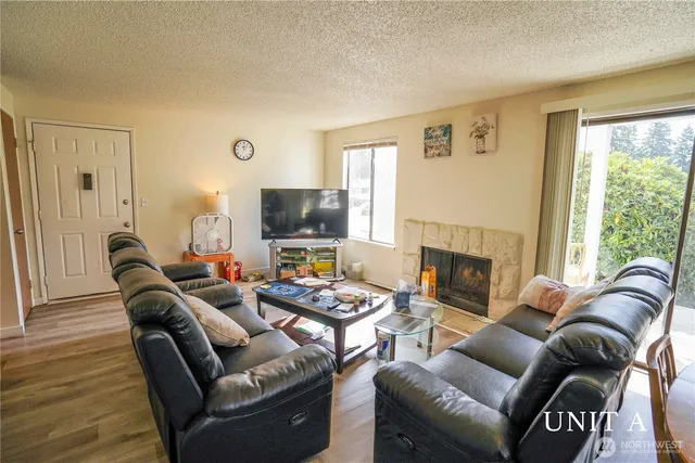 a utility room with sink dryer and washer