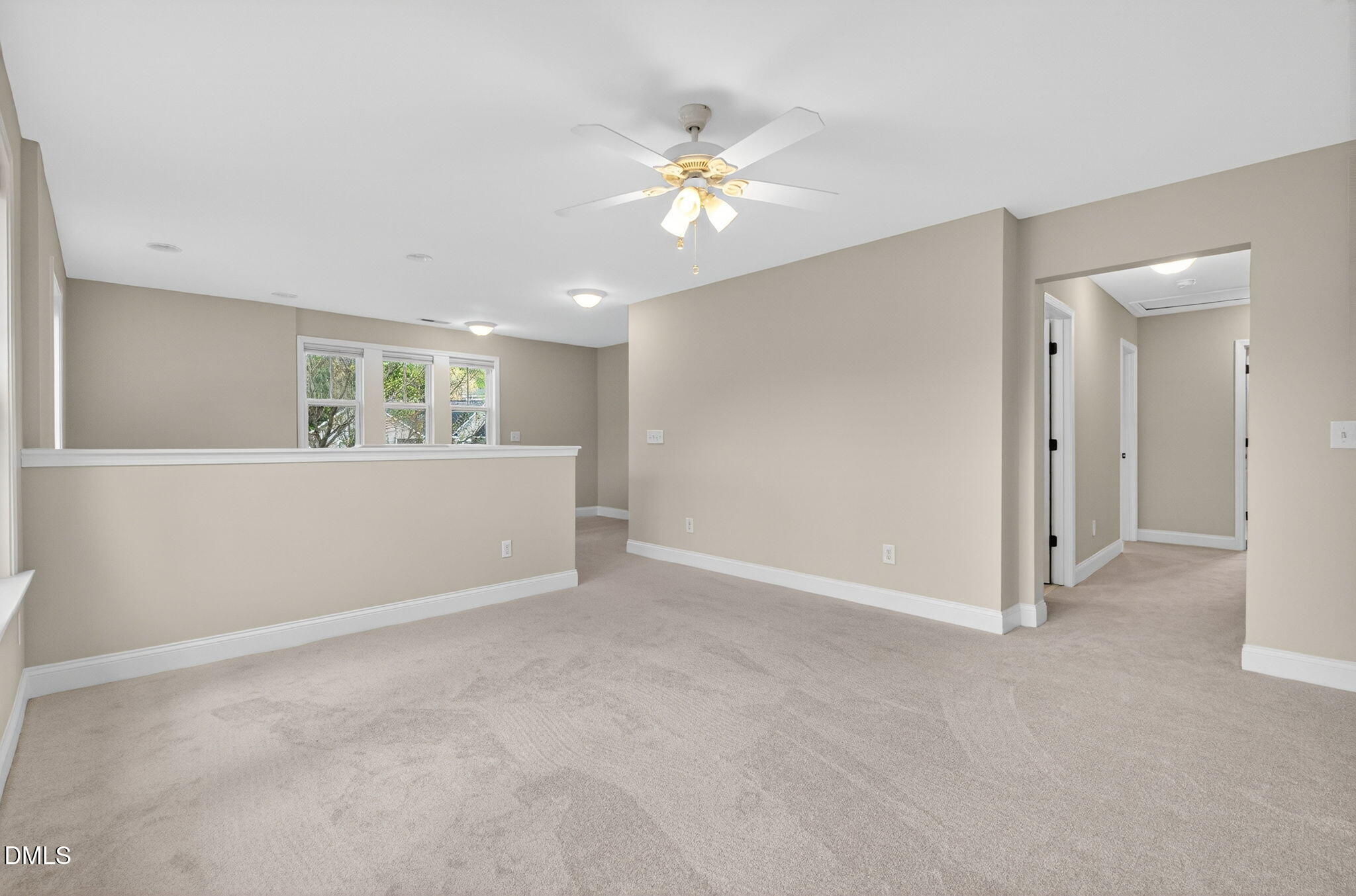 1304 Barnford Mill Road Wake Forest, NC 27587 - Photo 23 of 44 a view of a livingroom with a ceiling fan and window