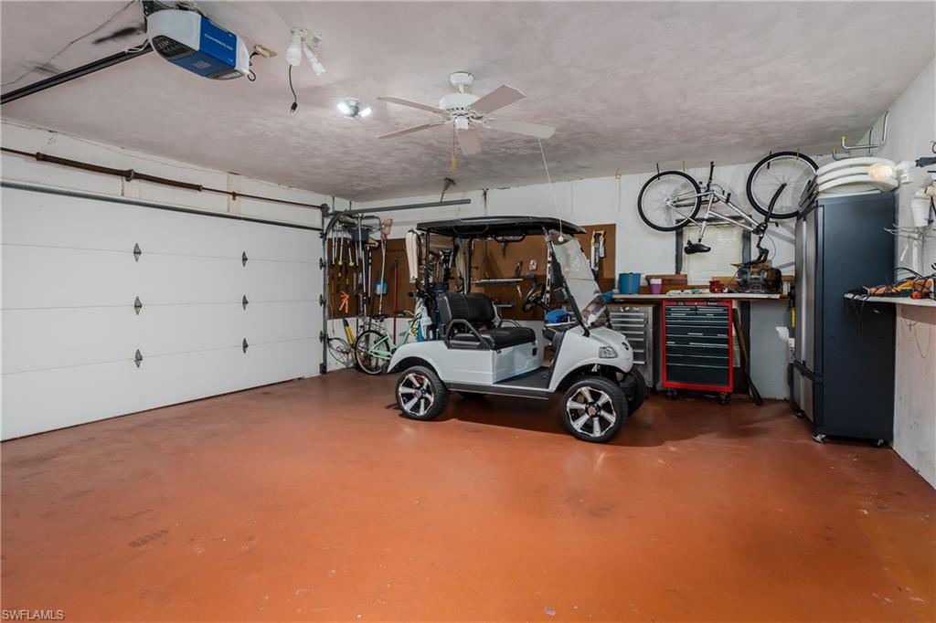 1502 Foxfire Lane Naples, FL 34104 - Photo 35 of 49 a view of a room with gym equipment