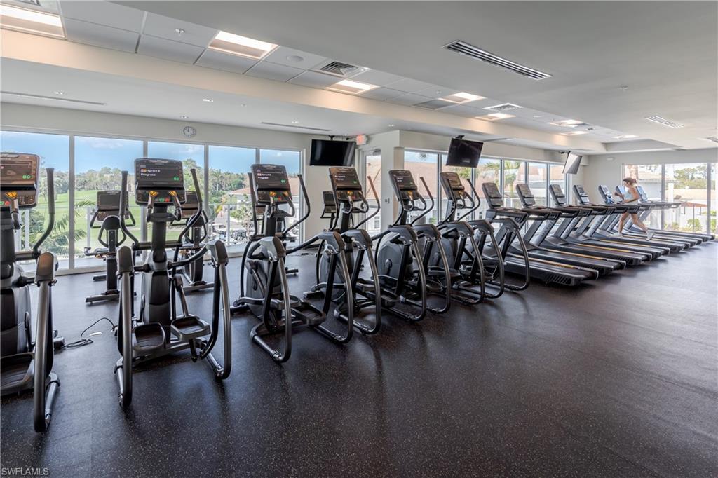 1502 Foxfire Lane Naples, FL 34104 - Photo 43 of 49 a view of a room with gym equipment