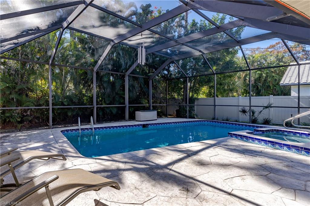 1502 Foxfire Lane Naples, FL 34104 - Photo 8 of 49 a view of a backyard