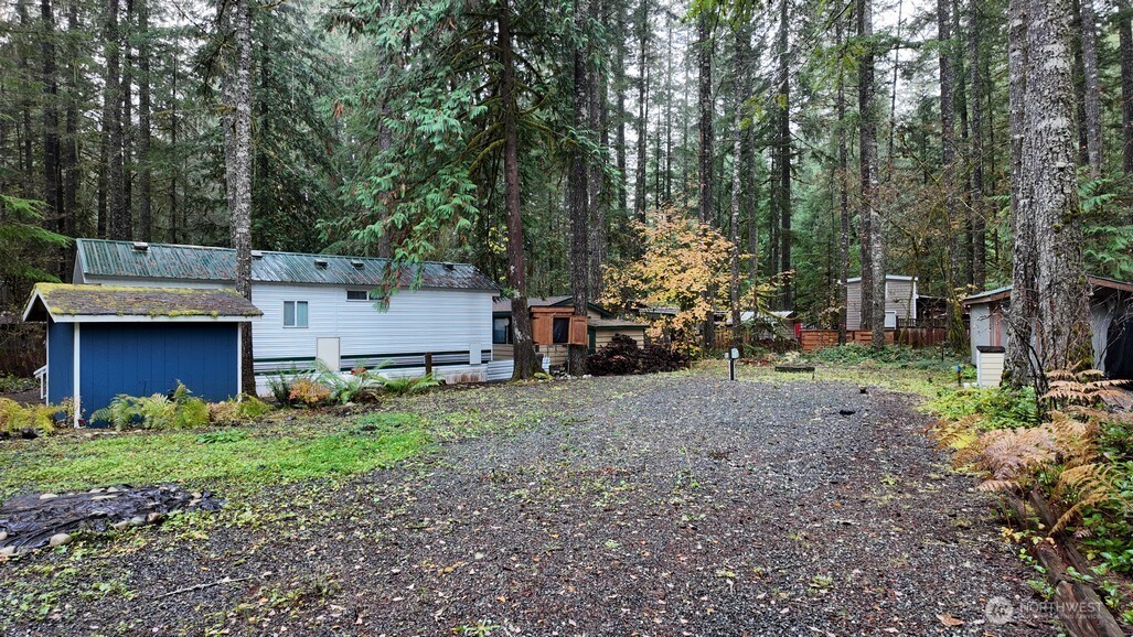 82 Riverside Drive Deming, WA 98244 - Photo 2 of 33 a view of a house with a yard and tree s