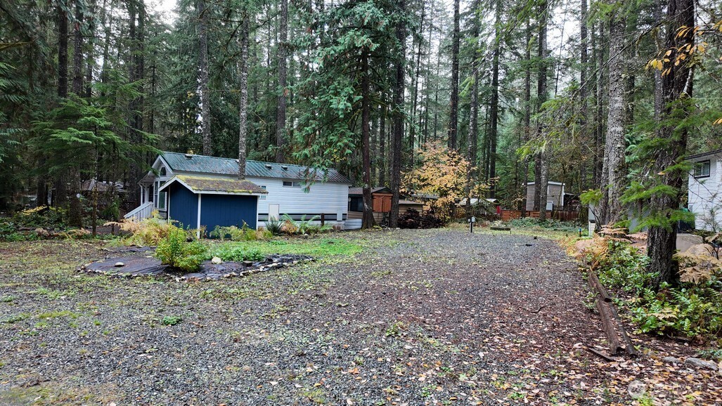 82 Riverside Drive Deming, WA 98244 - Photo 3 of 33 a view of house with yard and entertaining space