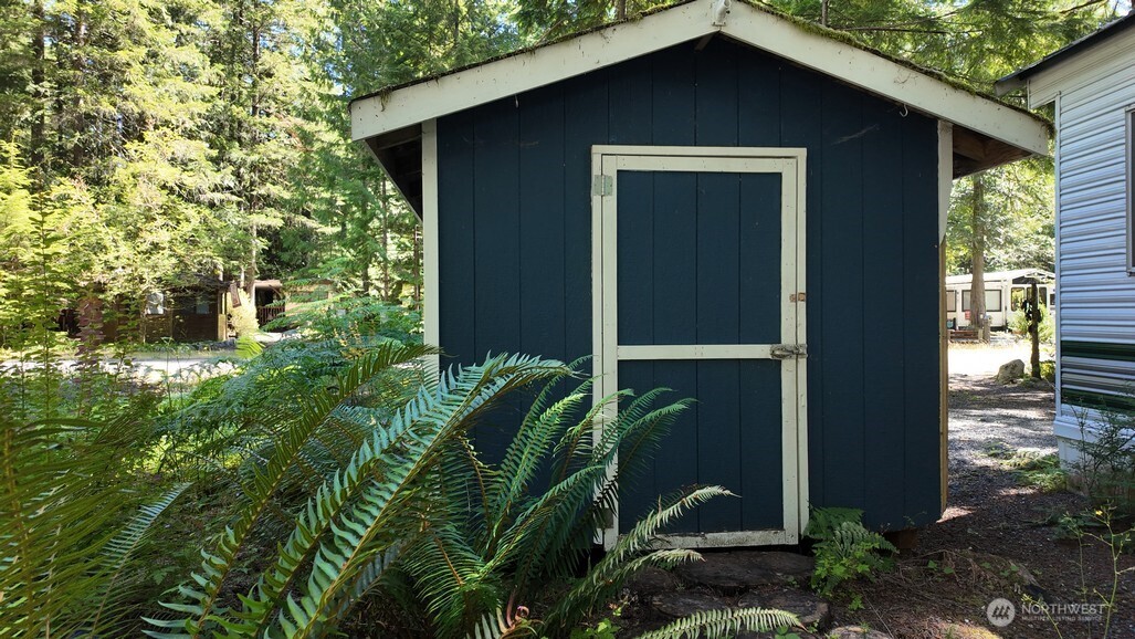 82 Riverside Drive Deming, WA 98244 - Photo 9 of 33 a yellow house with outdoor space