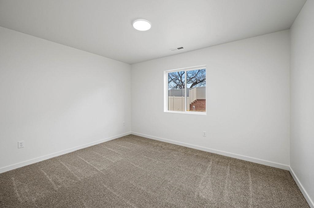 166 Orchard View Way Grand Junction, CO 81503 - Photo 18 of 20 an empty room with a window