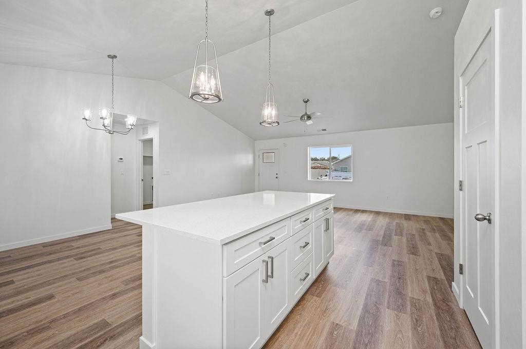 166 Orchard View Way Grand Junction, CO 81503 - Photo 8 of 20 a kitchen that has a lot of cabinets in it