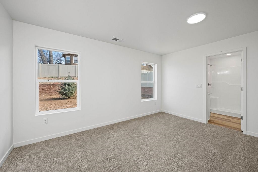 166 Orchard View Way Grand Junction, CO 81503 - Photo 9 of 20 a view of an empty room with a window