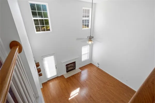 a view of a hallway with windows