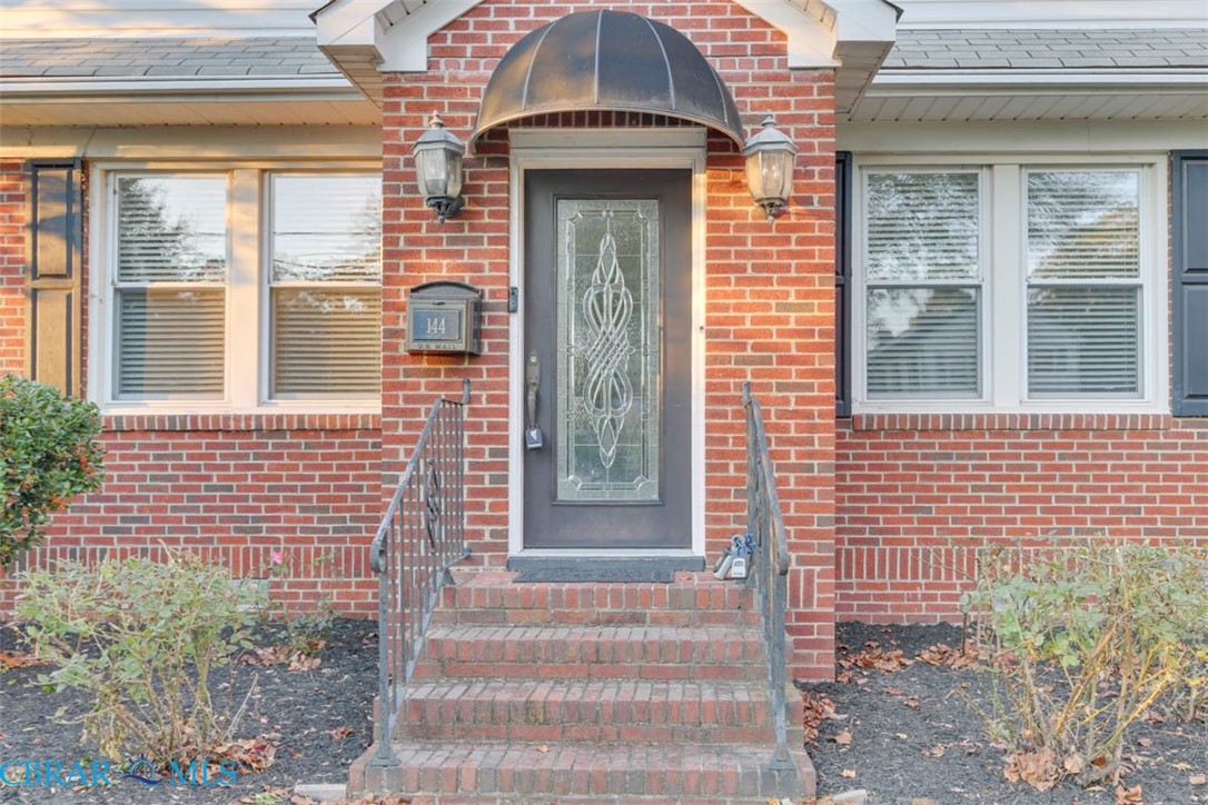 144 Meredith Street Hampton, VA 23669 - Photo 4 of 36 a front view of a house