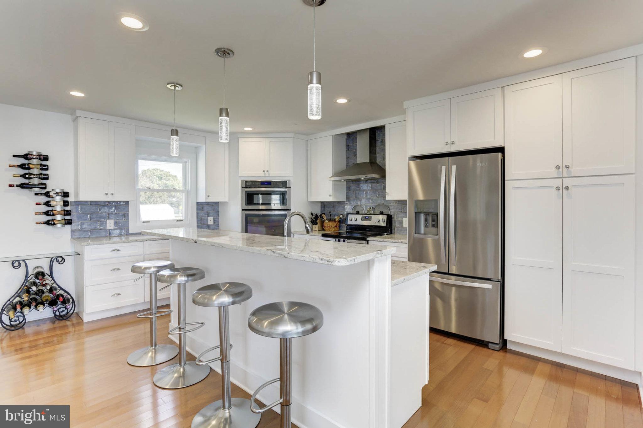 2103 Poplar Ridge Road Pasadena, MD 21122 - Photo 17 of 38 Breakfast Bar w/ seating for 4