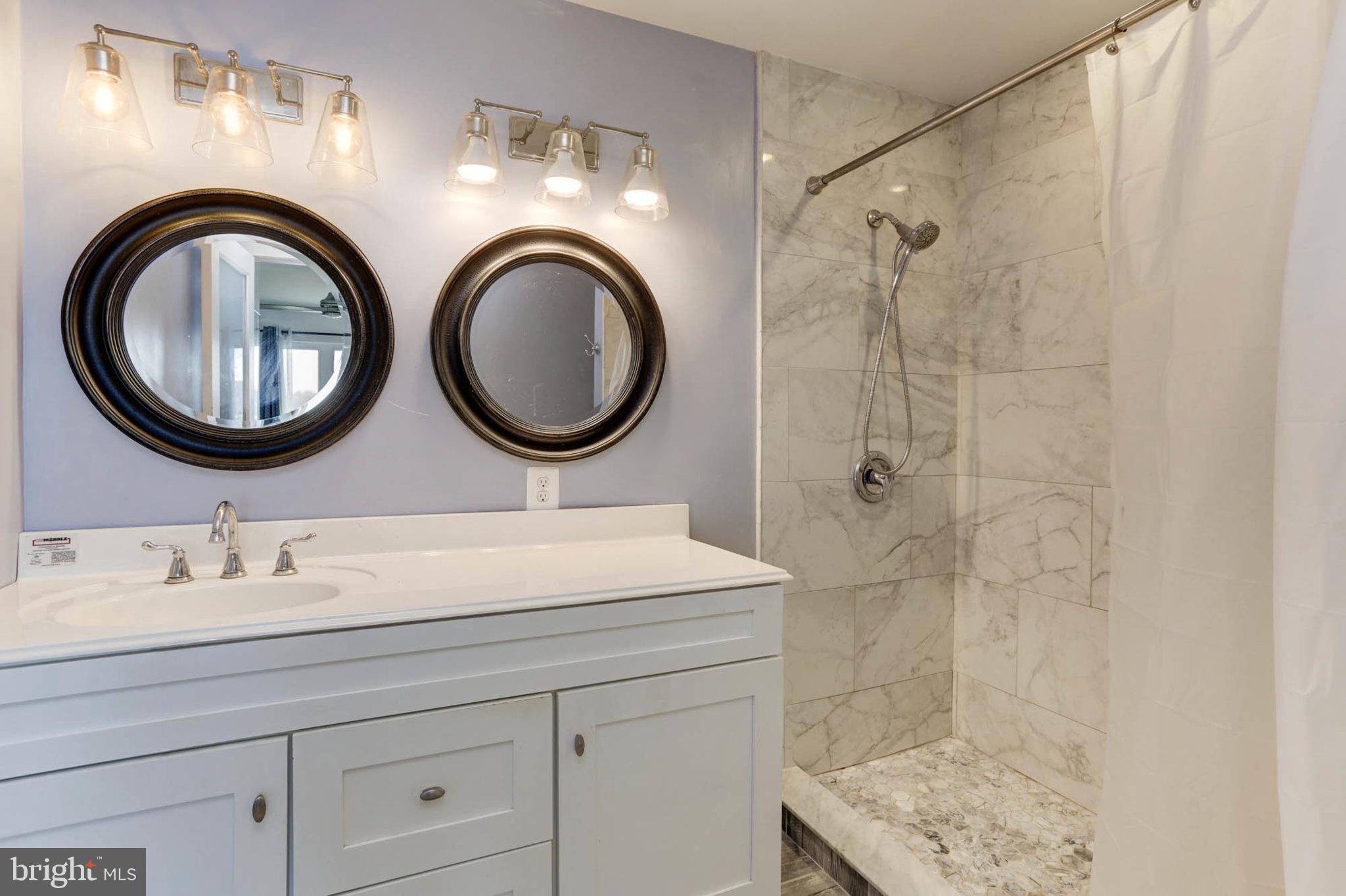 2103 Poplar Ridge Road Pasadena, MD 21122 - Photo 25 of 38 En-suite Bath w/ marble surround shower & counter