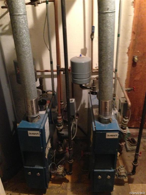 658 East 216th Street, Unit 3 Bronx, NY 10467 - Photo 6 of 10 Utility room featuring a heating unit